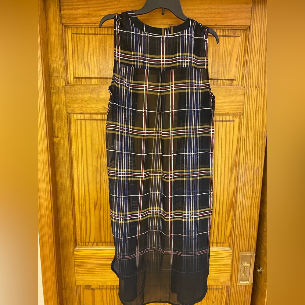 Chiffon tank that could go over a dress or shirt with jeans or even shorts.